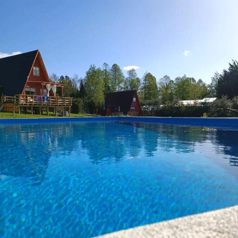 Pucón, sector Candelaria, parcela con 3 casas, vista al lago - 01 parcela candelaria pucon piscina vista lago
