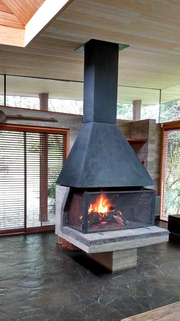 Pucón, preciosa casa en condominio a 10 mins de Pucón - 06 casa condominio rio trancura pucon chimenea