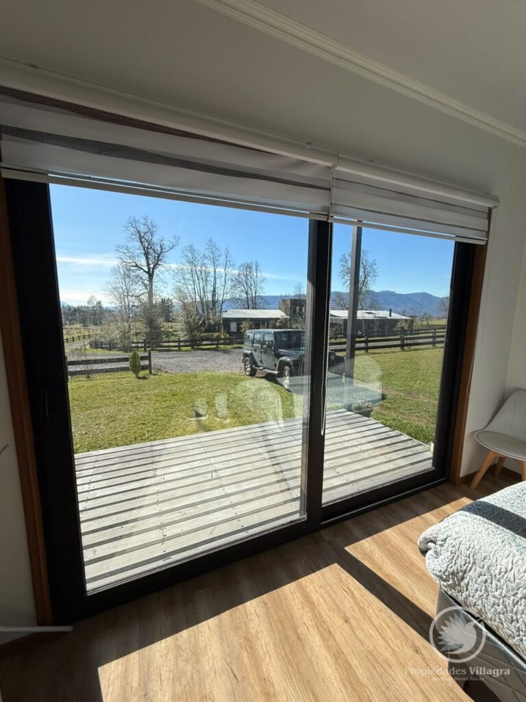 Casa Pucón, condominio Los Riscos (vista Volcán y lago) - Casa pucon los riscos vista volcan lago 26 ventana vista terraza jardin auto