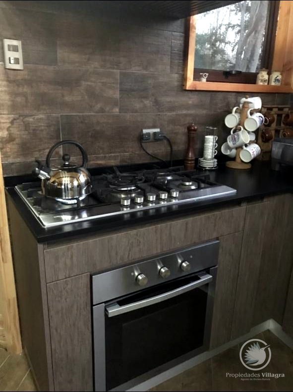 Venta de cómoda y acogedora casa en parcela - Casa pucon parcela 15 cocina estufa tetera